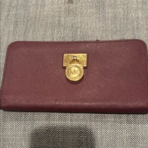Michael Kors Plum Wallet with Gold Accent